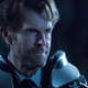 Kevin Conroy as Bruce Wayne.